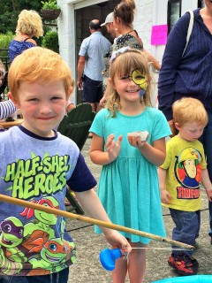 Face painting at the duck races...